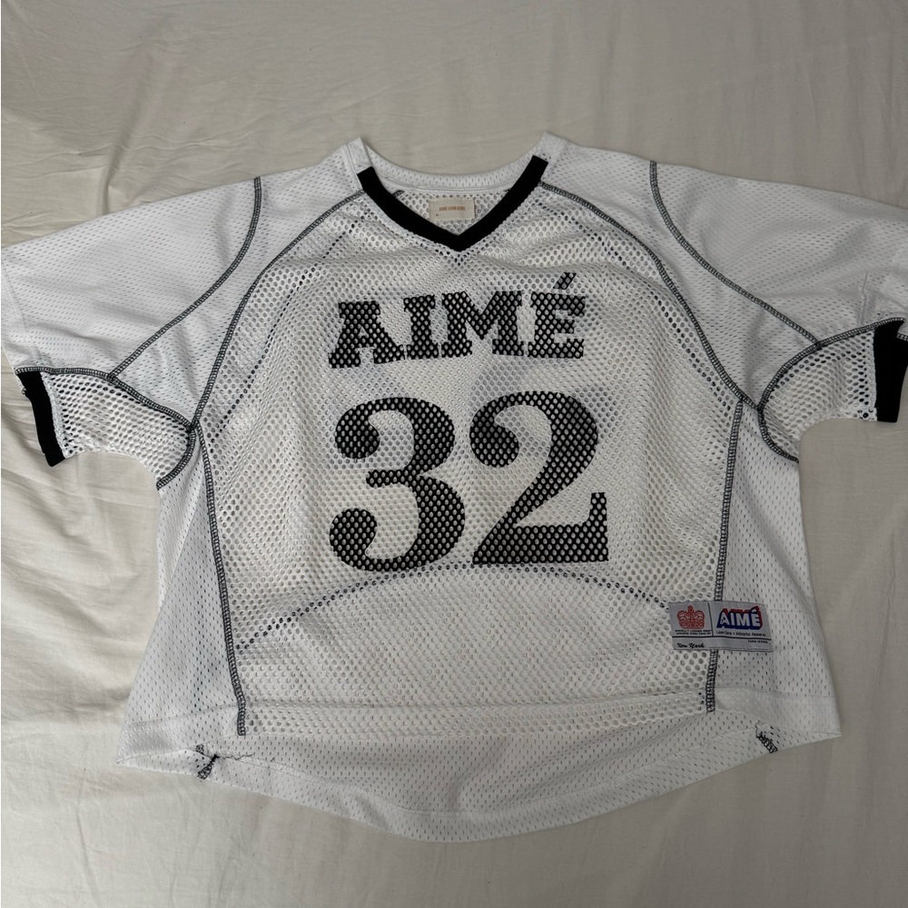 Aime Leon Dore White Mesh Jersey with Black Trim and Number 32